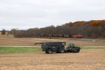 BNSF 8567 comes out of the trees heading west on the Ottumwa Sub with TVA coal empties